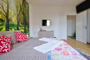 Postel nebo postele na pokoji v ubytování R & R Apartment