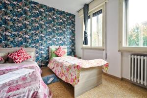 Postel nebo postele na pokoji v ubytování R & R Apartment