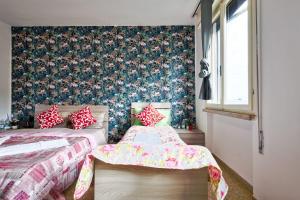 Postel nebo postele na pokoji v ubytování R & R Apartment