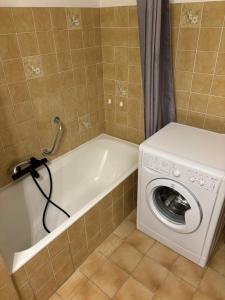Kúpeľňa v ubytovaní Appartement - les jardins de Cybèle - Gréoux-Les-Bains