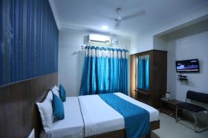 Letto o letti in una camera di Hotel BCP Suites