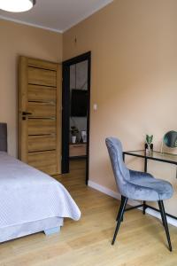 Postel nebo postele na pokoji v ubytování SanHeksan