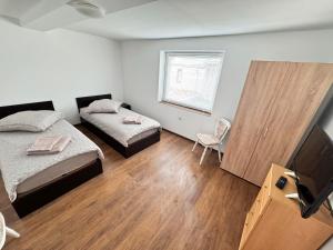 Postel nebo postele na pokoji v ubytování Gästehaus EMELI