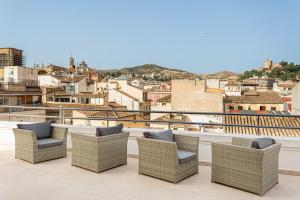 Ein Balkon oder eine Terrasse in der Unterkunft Room Mate Leo, Granada