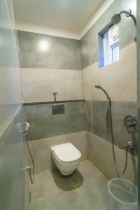Vannituba majutusasutuses Satyabhama Inn