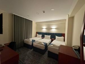 Ένα ή περισσότερα κρεβάτια σε δωμάτιο στο ديار المروة