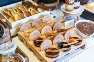a display of different types of pretzels and other pastries at Rise Urban Art Hotel in Larnaca