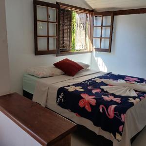 Postel nebo postele na pokoji v ubytování Villa dos Pássaros Paraty Hospedagem