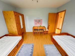 Ένα ή περισσότερα κρεβάτια σε δωμάτιο στο Ostseehuus Apartment II