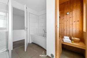 Ένα μπάνιο στο Ferienhaus Strandnest Olpenitz