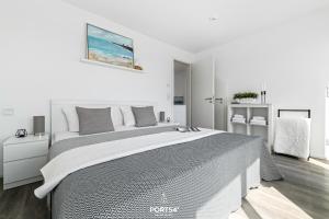 Ένα ή περισσότερα κρεβάτια σε δωμάτιο στο Ferienhaus Strandnest Olpenitz