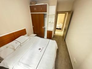 科润酒店公寓にあるベッド