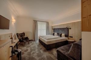Łóżko lub łóżka w pokoju w obiekcie RESL Resort