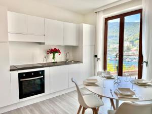 Η κουζίνα ή μικρή κουζίνα στο Mirage Rooms & Apartments +19 φωτογραφίες