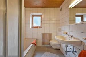 Koupelna v ubytování Apartment Alpin + 8 fotografií