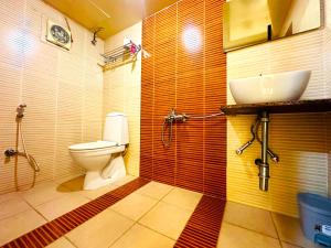 Koupelna v ubytování Aundh Elite Stay