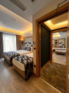 Postel nebo postele na pokoji v ubytování Downtown Sirkeci Hotel