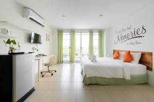 Postel nebo postele na pokoji v ubytování Little Home Ao Nang