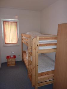 Postel nebo postele na pokoji v ubytování Ferienhaus Zum Kammergut LINKS oder RECHTS