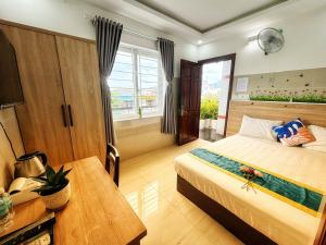 Postel nebo postele na pokoji v ubytování SixPearl Hotel