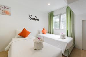 Postel nebo postele na pokoji v ubytování Little Home Ao Nang