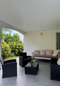 Posezení v ubytování Casa Tropical · T3 Calme & Spacieux
