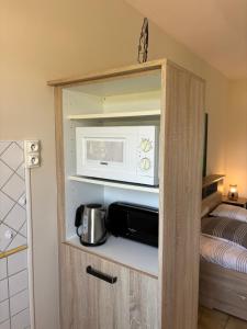 Kuchyňa alebo kuchynka v ubytovaní Appartement - les jardins de Cybèle - Gréoux-Les-Bains