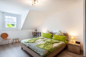 Postel nebo postele na pokoji v ubytování Haus Panoramasicht
