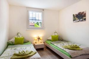 Postel nebo postele na pokoji v ubytování Haus Panoramasicht