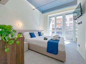 TV a/nebo společenská místnost v ubytování Porta Venezia - Luxy Suites - 6 camere
