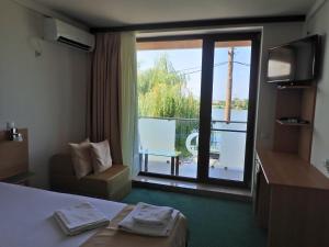Postel nebo postele na pokoji v ubytování Delta Palace + 37 fotografií