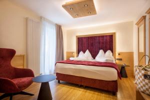 Postel nebo postele na pokoji v ubytování Adler Hotel Wellness & Spa - Andalo + 37 fotografií