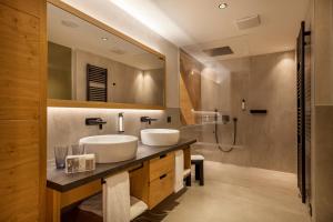 Koupelna v ubytování Adler Hotel Wellness & Spa - Andalo