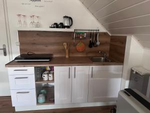 Η κουζίνα ή μικρή κουζίνα στο Gemütliche Ferienwohnung in Rödermark