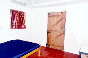 Voodi või voodid majutusasutuse Nimal's white house toas
