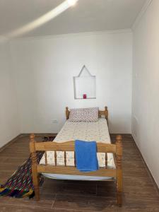 Postel nebo postele na pokoji v ubytování Kulla e Lulash Keqit Theth + 7 fotografií