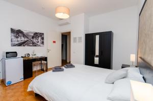 Postel nebo postele na pokoji v ubytování Silver Room