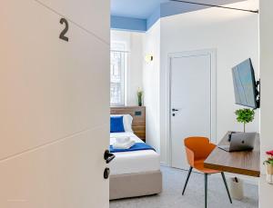 TV a/nebo společenská místnost v ubytování Porta Venezia - Luxy Suites - 6 camere