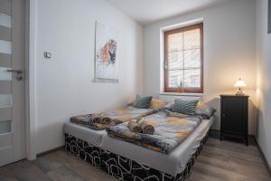 Posteľ alebo postele v izbe v ubytovaní Elements Apartments & Renata
