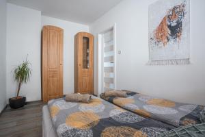 Posteľ alebo postele v izbe v ubytovaní Elements Apartments & Renata