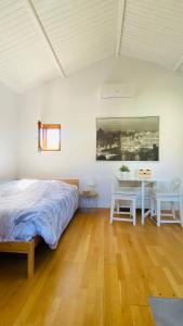 Postel nebo postele na pokoji v ubytování Le Chalet Pignantais avec option Jacuzzi