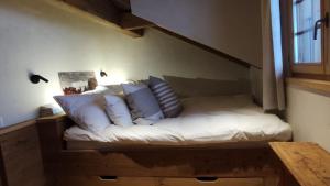 Voodi või voodid majutusasutuse Standalone Chalet With Breathtaking Sanetsch View toas