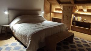 Voodi või voodid majutusasutuse Standalone Chalet With Breathtaking Sanetsch View toas
