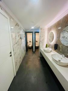Koupelna v ubytování Aldino Hotel & Spa + 21 fotografií