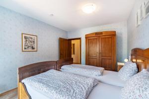 Postel nebo postele na pokoji v ubytování Haus Berger