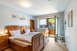 Postel nebo postele na pokoji v ubytování Haus Berger