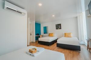 Krevet ili kreveti u jedinici u okviru objekta Hotel Quinto Nivel