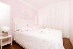 Postel nebo postele na pokoji v ubytování Apartments Emma + 37 fotografií
