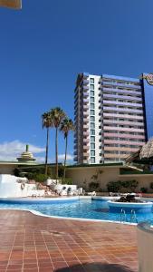 Swimmingpoolen hos eller tæt på Cozy Ocean view 1 BDR APT, Club Paraiso