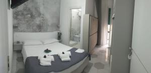Posteľ alebo postele v izbe v ubytovaní B&B Le due costiere